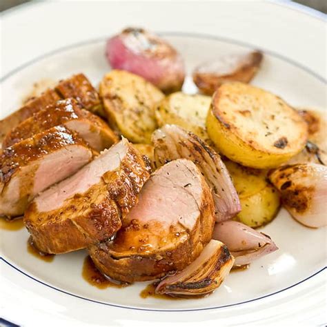 Halve the potatoes and onion, leaving the skin on. Pork Tenderloin with Roasted Potatoes and Shallots | Cook ...