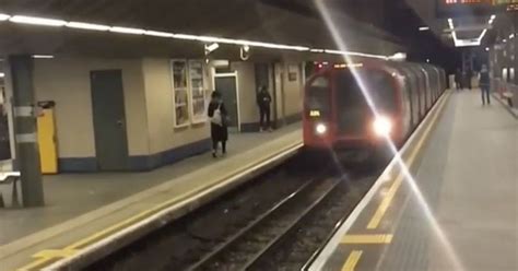 Heart Stopping Footage Shows Reckless Idiot Long Jumping In Front Of Oncoming Tube At Busy