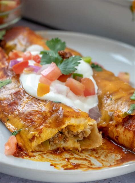 This easy beef enchilada recipe is one you'll want to keep on hand to use when you want to get dinner on the table quickly. Ground Beef Enchiladas - Tornadough Alli