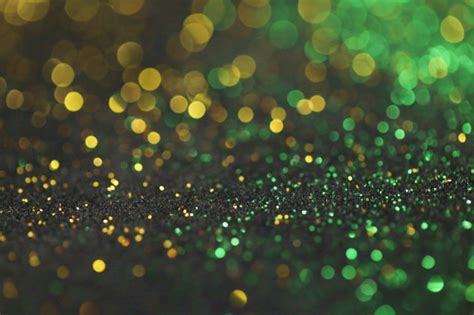 Premium Photo Gold And Green Glitter Background With Shining Bokeh