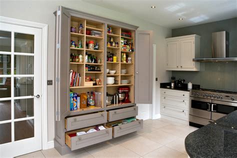 This kitchen pantry has 2 door cabinets with adjustable shelves, 1 large drawer, and 1 middle compartment that provides ample and multiple storage spaces for dishes. Gorgeous freestanding pantry cabinet in Kitchen ...