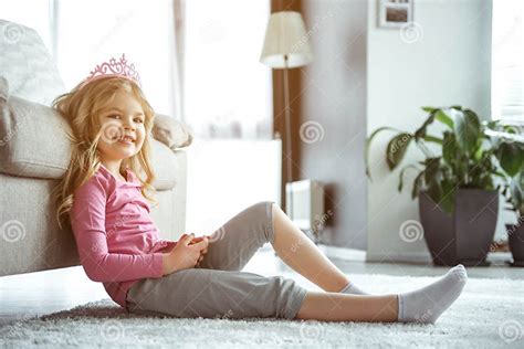 Cute Little Girl Dreaming In Living Room Stock Image Image Of Leisure