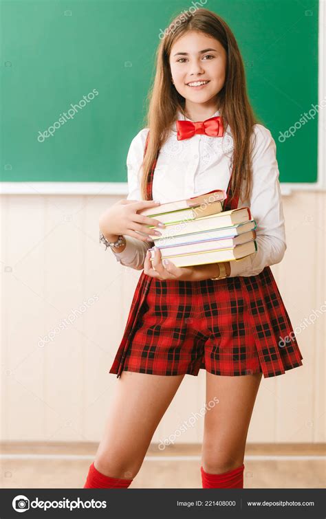 Beautiful Young School Girl School Uniform Standing Books Her Hands