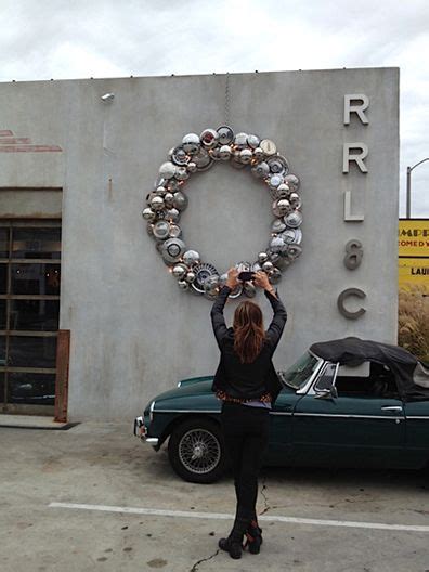 35 clever ideas for using car parts as home decor. Hubcap / car parts wreath -This is perfect for my car wash ...