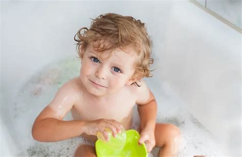 Adorable Baby Boy Taking A Bath With Soap Suds On Hair Stock Photo By