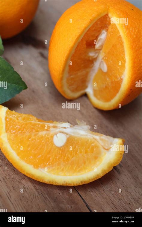 Sliced Fresh Malta Orange Fruit On Wooden Surface New Malta Orange