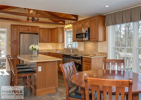 Norfolk kitchen & bath is a kitchen cabinet design & remodeling showroom that has 5 area showrooms, located in boston ma, braintree ma, salem nh, nashua nh, and manchester nh. Traditional Cherry Kitchen With Exposed Beams | Norfolk ...