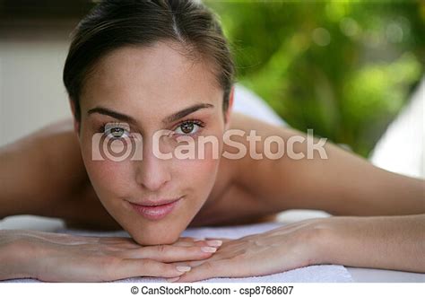 Woman Patiently Waiting For Her Back Massage Canstock