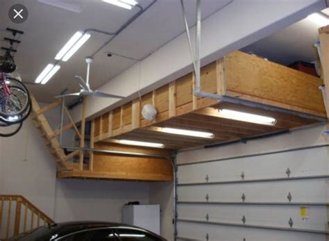 Storage Loft Above Garage Door Mechanism Our House Overhead Garage