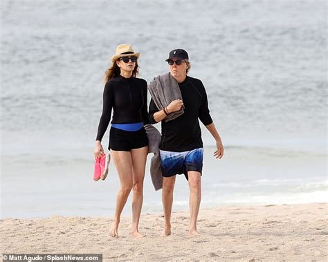 Paul Mccartney Gets Helping Hand Out Of Sea From Wife In The Hamptons