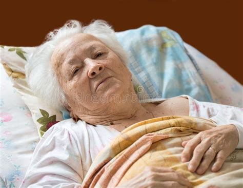 Old Woman Laying At Bed Stock Image Image Of Indoor 30946041