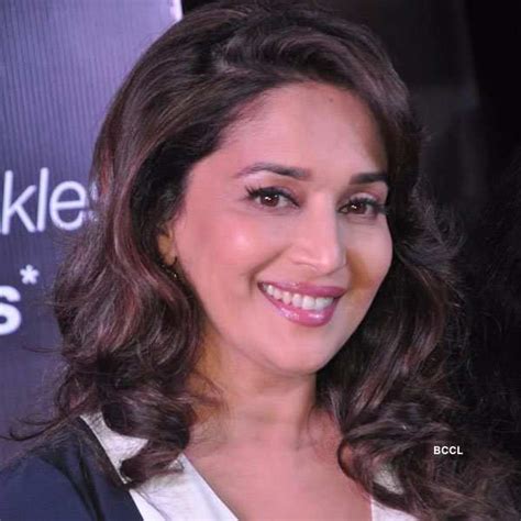 Madhuri Waves To Her Fans As She Arrives At The The Launch Of The Cream