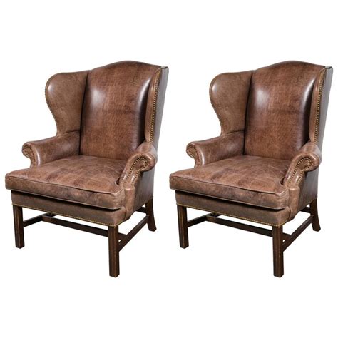 Shop axiom walnut brown oversized leather chair. Pair of Oversized Leather Wing Chairs For Sale at 1stdibs