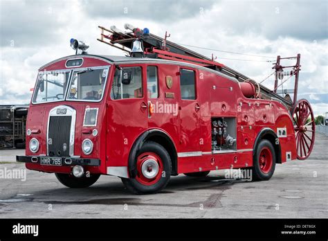 A Vintage British Dennis Fire Engine At The Scene Of An Incident Stock