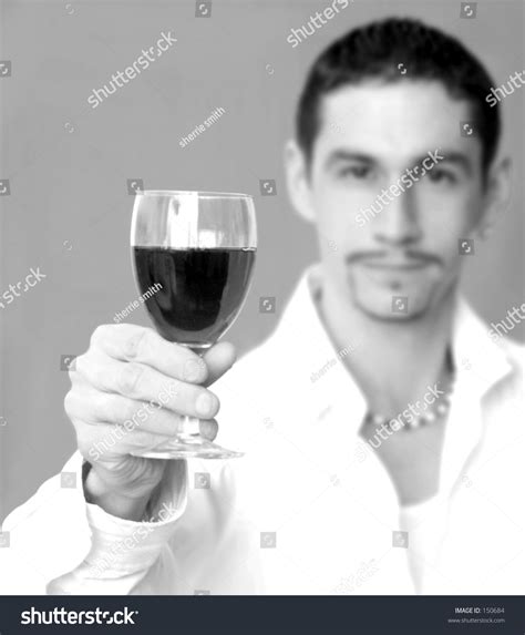 A wine bottle is a bottle, generally a glass bottle, that is used for holding wine.some wines are fermented in the bottle while others are bottled only after fermentation. Man Holding Out Glass Of Wine ,Selective Focus Stock Photo 150684 : Shutterstock