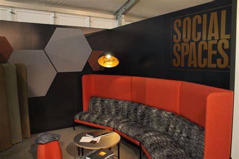 Social Spaces Within An Office Interior With Soft Seating And Lighting