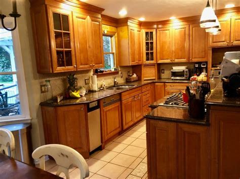 What's the best color for brown granite countertops? What color white for cabinets to match baltic brown granite?