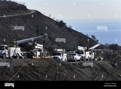 Crews Works To Restore Power Lines On Latigo Canyon In Malibu