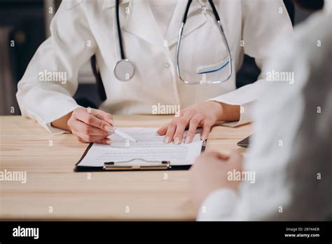 A Female Physician A Interviewing A Patient Stock Photo Alamy