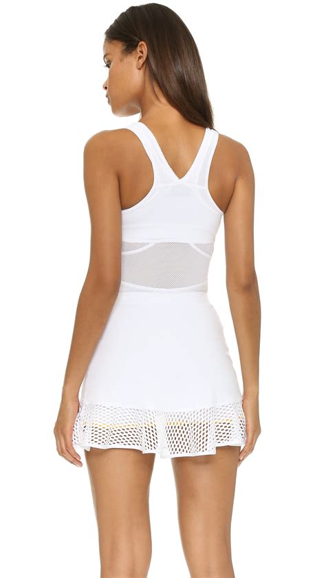 Shorts with deeper pockets for balls) and sponsor professional tennis players. Lyst - Adidas By Stella Mccartney Stella Tennis Dress ...