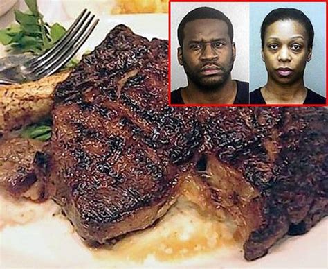 A Man And Woman Are Looking At A Steak On A Plate With A Fork In Front Of Them