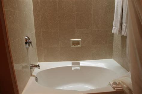 Any porcelanosa bathtub is conceived from a unique creative perspective and is created for design lovers while always being highly functional. nice small bathtub. - Picture of Magnolia Hotel Houston ...