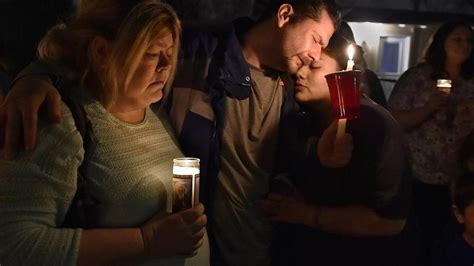 families come together in candlelight vigil for four slain in kck kansas city star