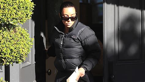 Kim Kardashian Seen Holding A Folder Of Papers After Clapping Back At