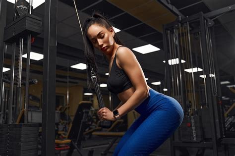 Premium Photo Sexy Athletic Girl Working Out In Gym