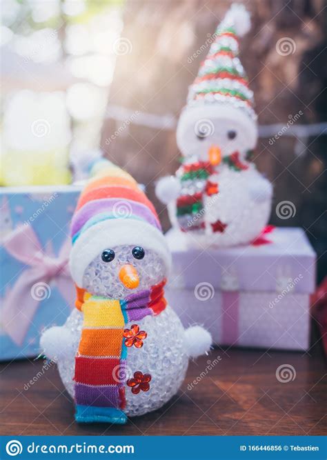 Merry Christmas Background Little Cute Snowman With Colorful Dress