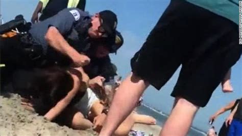 police officer punches woman in new jersey beach arrest cnn