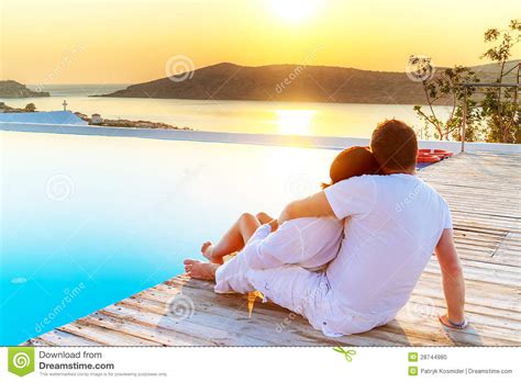 Drag and drop file or browse. Couple In Hug Watching Sunrise Stock Photo - Image: 28744980