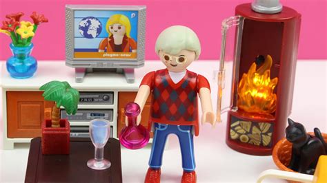 ¡la mamá está preparando el baño para su bebé mientras que el papá está haciendo la comida en la cocina! Sala de estar de Playmobil (5332) Serie rosa | Juguetes de ...