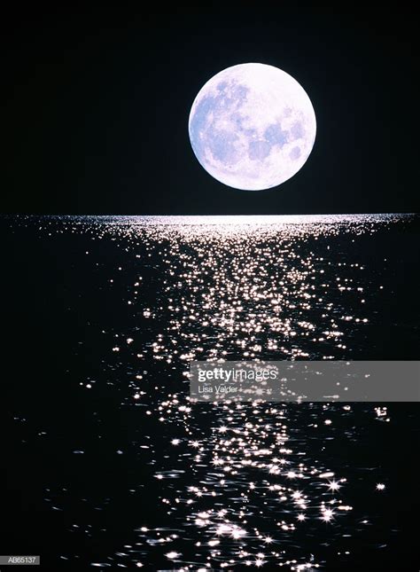 Full Moon Shining Over Water High Res Stock Photo Getty