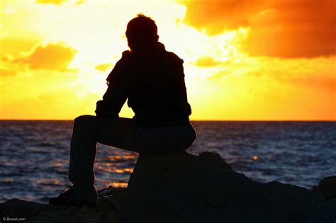 Man Sitting And Watching Beach Sunset Stock Photo Our Photography