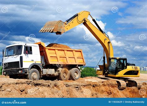 Excavator Loading Dumper Truck Stock Image Image 11833629