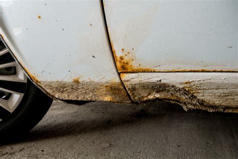 Car Body Surface With Damage Due To Accident Close Up Stock Image
