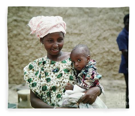 Mother With Son In Dori Burkina Faso African Diaspora Fleece Blanket By Wernher Krutein Pixels