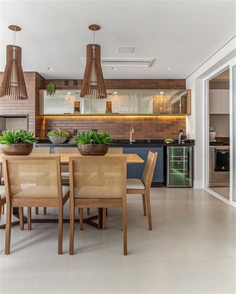 Área gourmet rústica projetos para inspirar o cantinho de lazer Kitchen design Tropical