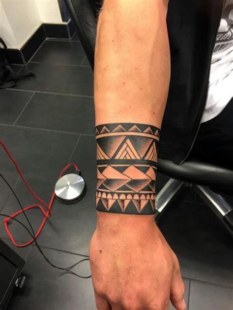 You can try this tattoo bracelet in a bolder color. 45 Masculine Armband Tattoo Designs for Men | Tribal ...