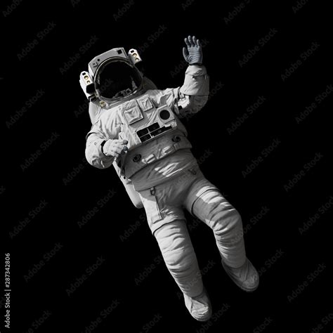 Astronaut Floating In Outer Space Isolated On Black Background Stock