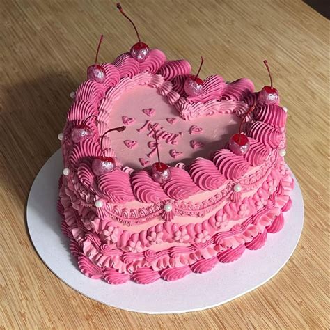 Pink Heart Shaped Cake With Pink Piping And Pink Glitter Cherries 19th Birthday Cakes Heart