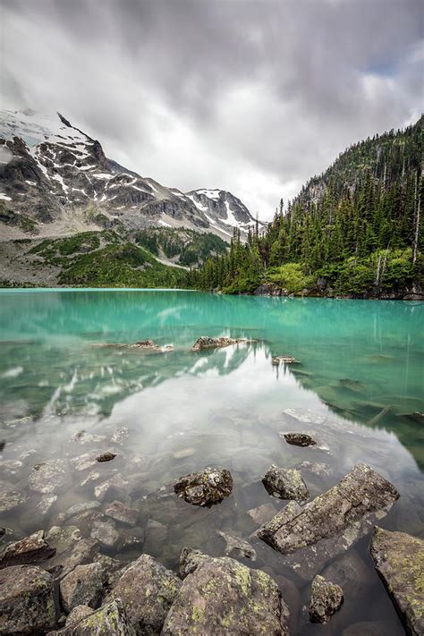 Turquoise Lake In The Mountains Photograph By Pierre Leclerc