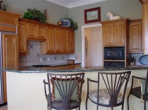 Oak cabinets with blue/green walls | kitchen remodel, oak. Pin by Sarah on Kitchen | Kitchen remodel, Kitchen design, Kitchen wall colors