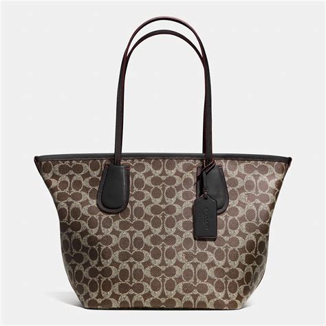 Coach Taxi Zip Top Tote In Signature Canvas In Brown Lyst
