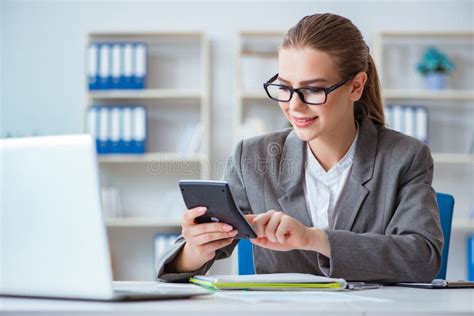 The Young Businesswoman Accountant Working In The Office Stock Image