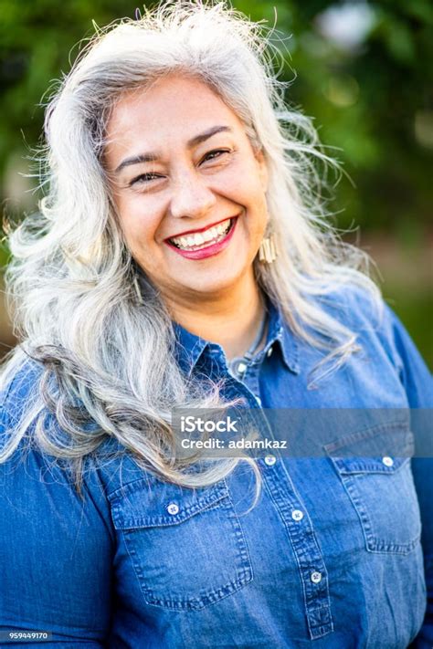 Portrait Of A Beautiful Senior Mexican Woman Stock Photo Download