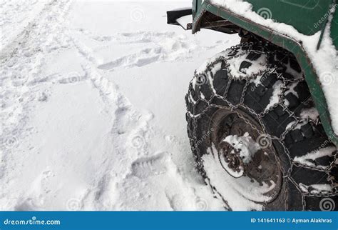 Metal Chain On Off Road Truck Tire In Snowy Road Stock Image Image Of