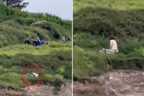 couple caught having sex on edge of a cliff in video