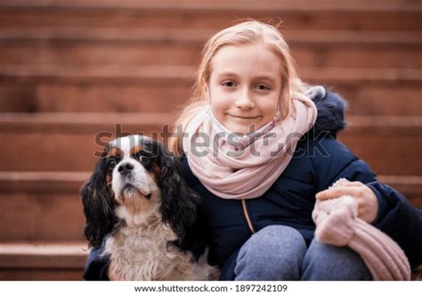 Cute Smiling Little Girl Hugging Dog Stock Photo Edit Now 1897242109